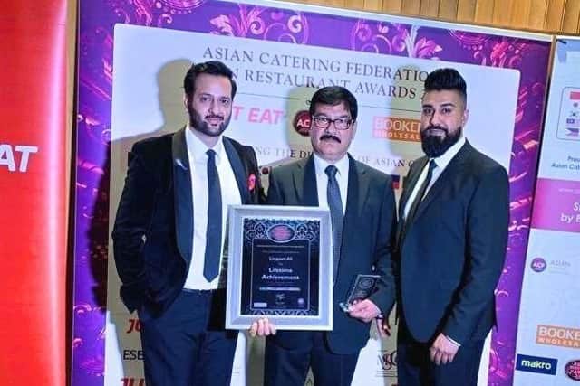 Pictured at the awards, from left to right, are: Dr Ali, Liaqat Ali and Asif Ali.