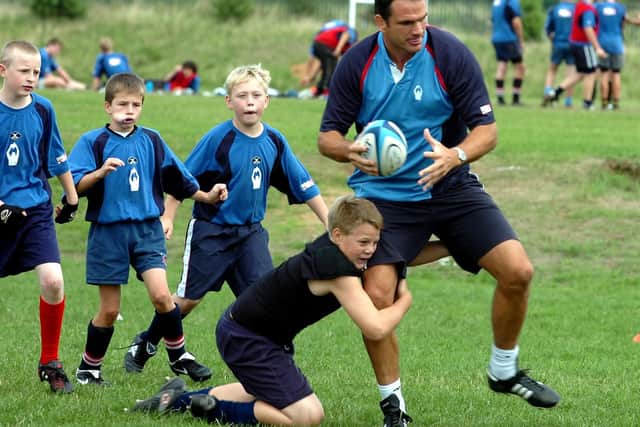 Ex England Rugby Union captain Martin Johnson is pictured at a  Castle Park summer camp