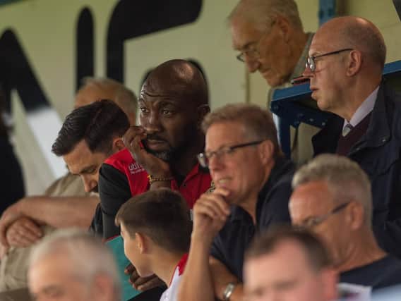 Darren Moore watches from the stands at Gainsborough. Picture: Steve Flynn