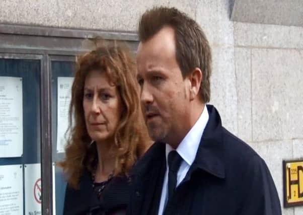 DI Martin Brunning and Karen Buck