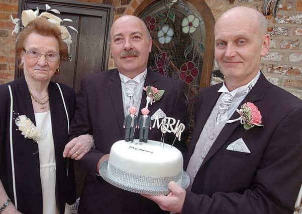 Alvin and Kevin Robinson with Alvin's mum Margaret enjoy their wedding day at the Red Lion, Epworth.  (Buy this photo E2286TS) Picture: Tony Saxton
