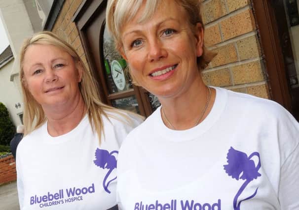 Lisa Sharp (l) and Maxine Strong with their new t-shirts for the Pride of the Isle. Picture: Andrew Roe