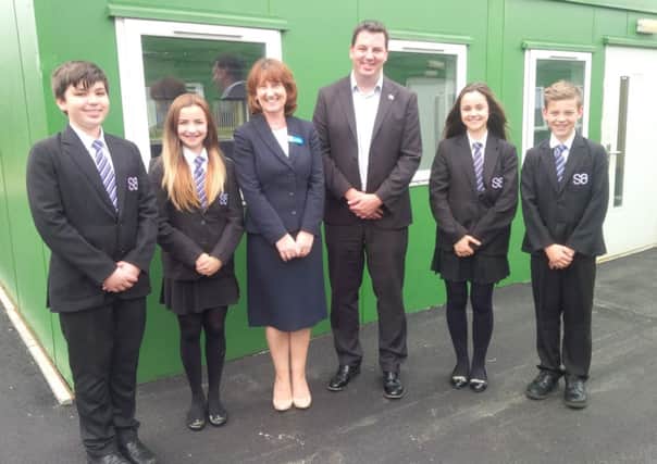 Andrew Percy with executive head of South Axholme Academy Marie Lister and pupils.