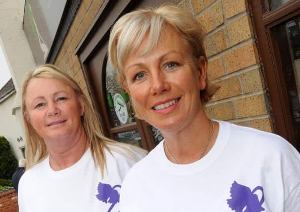 Leesa Sharp (l) and Maxine Strong with their new t-shirts for the Pride of the Isle. Picture: Andrew Roe
