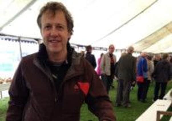 Christian Melton who won three first prizes in the Wine Section at the 2014 Epworth Show.