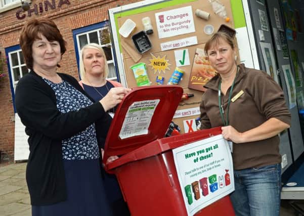 Marj Prendergast, Waste Recycling Services officer, Karen Broderick, Waste Support Services Manager and Clair Moore,Education and Communication Officer, pictured at Epworth Market Place informing people of the changes coming into force regarding the Burgandy Bins. Picture: Marie Caley NEPB 09-09-14 Pledge 4 Plastics MC 2