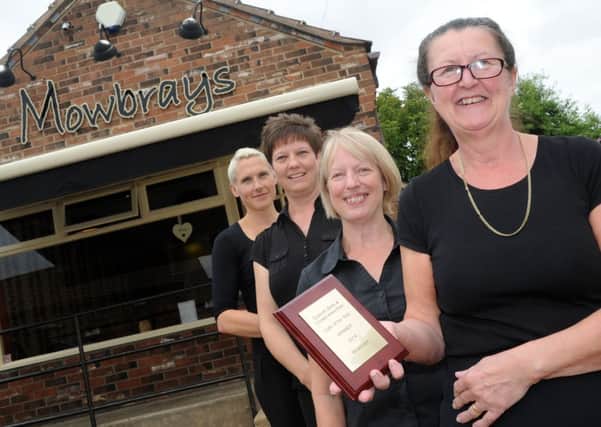 (r-l) Catherine Simpson, Kathryn Holmes, Karen Law, and Gail Hughes, of Mowbrays, Haxey, with their award for cafe of the year. Picture: Andrew Roe