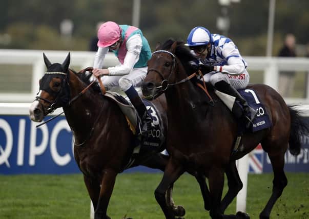 DUEL TO REMEMBER -- Noble Mission (far side) fights off Al Kazeem in the highlight of QIPCO British Champions Day at Ascot (PHOTO BY: Steve Parsons/PA Wire)