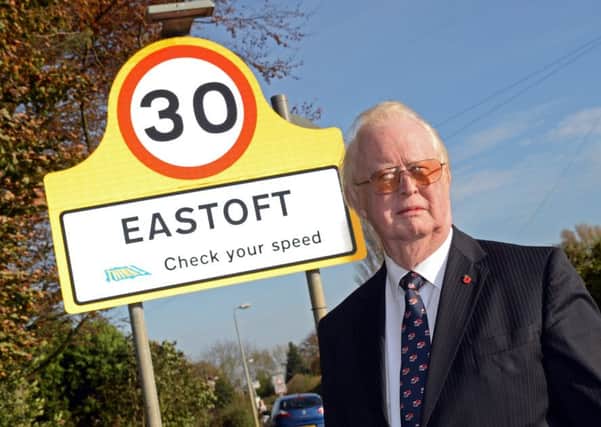 Councillor John Briggs pictured by the Eastoft village sign. Picture: Marie Caley NEPB 28-10-14 Eastoft Sign MC 1