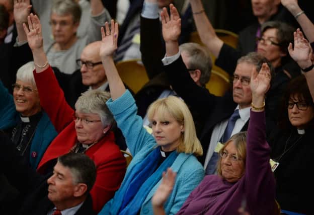The clergy casts votes in favour of women bishops at the Anglican General Synod in London earlier this year