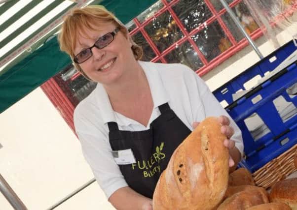 Sue Berry, Assistant Manager of Fullers Bakery, Epworth, displays some a selection of breads available. Picture: Marie Caley NEPB Food Fair MC 1