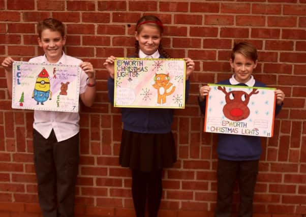 Epworth County Primary poster winners - 1. Hannah Maxfield, 11 yrs (centre); 2. Oliver Hall, 10 yrs (left); 3r. Jamie Huntington, 11 yrs (right).