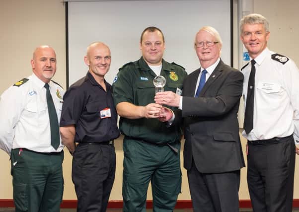 Pictured above from left to right: Vince Larvin of Yorkshire Ambulance Service, Shaun Rudland, YAS paramedic Andy Wallace, Councillor John Briggs and Chief Fire Officer Dene Sanders.