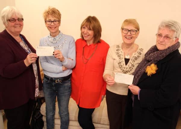 Crowle cheque presentation - (pictured from left) Christine Wharton (stroke prevention and support adviser at Scunthorpe Hospital), Paula Buttrick, Lynn Whalley, Val Janssen and Louise Wright (Isle of Axholme support group for Lindsey Lodge Hospice).