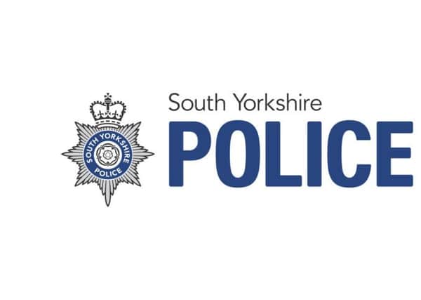 South Yorkshire Police logo.