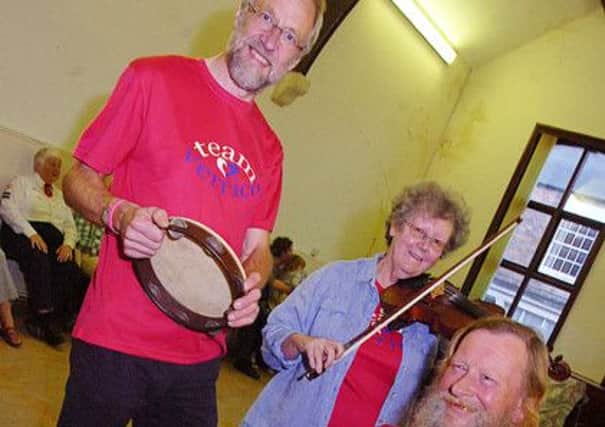 Dance tutor Peter Barnard, Katy Robinson and DAvid Prebble at the dance fundraiser at the Imperial Hall, Epworth.  The trio of musicians are know as Lys St. Georges.  (Buy this photo E1512TS) Picture: Tony Saxton