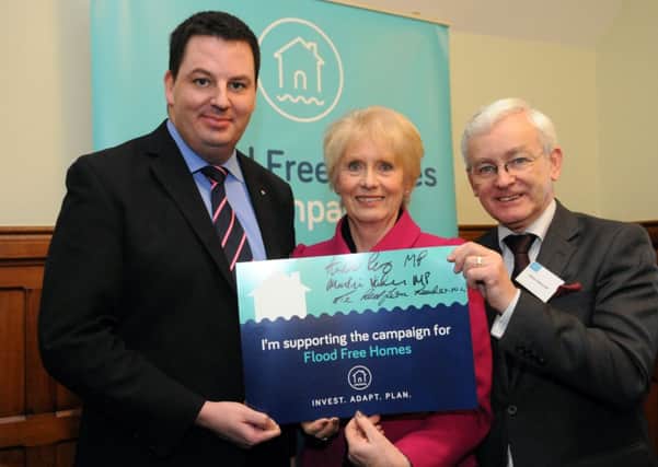 Supporting the campaign for flood free homes is (from left) Andrew Percy MP, North Lincolnshire Council leader Liz Redfern and Martin Vickers MP.