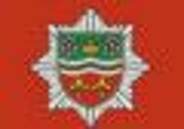 Humberside Fire and Rescue Service logo.