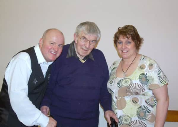 Brian Hastings is in the middle of Curtis Magee well known Irish singer ,and supporting artist Bev Rooker he booked for Crowle Community Hall.