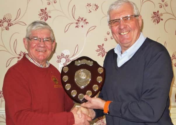 President of the Isle of Axholme Lions Graham Guest (Left) presents Lions member Alan Holgate with the District award for best Lions club website.
