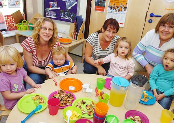 Youngsters enjoy nibbles at the Stay and Play event at Epworth Children's Centre. (Buy this photo E0866TS) Picture: Tony Saxton
