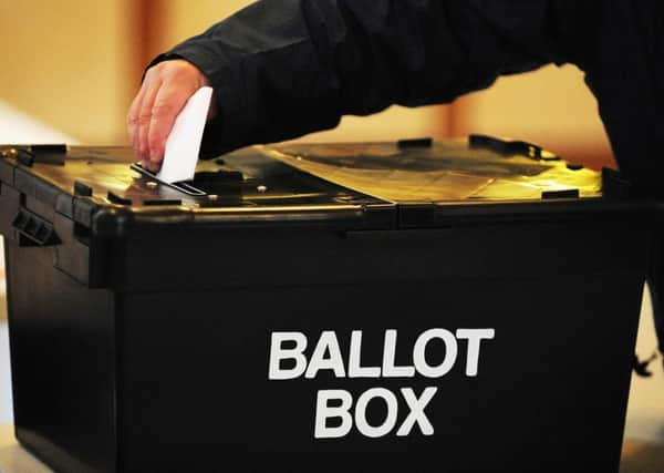 File photo dated 06/05/2010 of a voter placing a ballot paper in the ballot box at the polling station at Market Hall in Swadlincote, Derbyshire. Voters overwhelmingly believe there should be a referendum on Britain's relationship with the European Union, according to an opinion poll tonight. PRESS ASSOCIATION Photo. Issue date: Monday June 11, 2012. The survey by Populus for The Times found almost half - 49% - wanted a referendum immediately while a further third - 33% - believed there should be one "in the next few years". See PA story POLITICS Poll. Photo credit should read: Rui Vieira/PA Wire
