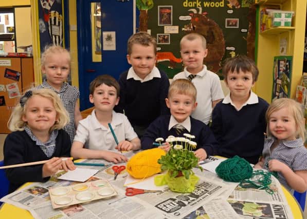 Nursery and reception children pictured getting to work on their Daisies for the school entrance display. Picture: Marie Caley NEPB 22-04-15 Westwoodside MC 4