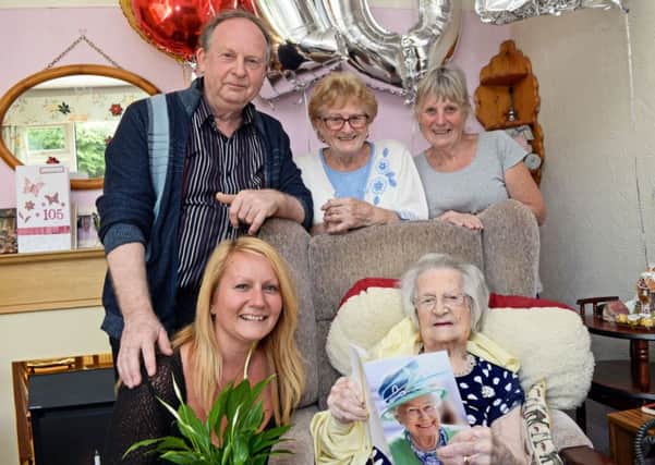 Elspeth Smith, celebrates her 105th birthday with family and friends. Amanda McKenzie, grandaughter, Ken Smith, son, Joyce Parry and Susan Cordingley, both daughters also pictured. Picture: Marie Caley NDFP 09-06-15 Smith MC 1