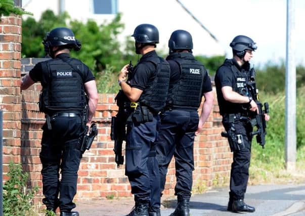Armed police on Upperthorpe Road, Westwoodside.  Picture: Andrew Roe