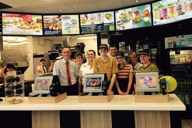 The team at the newly refurbished McDonald's with franchisee Mark Clapham.