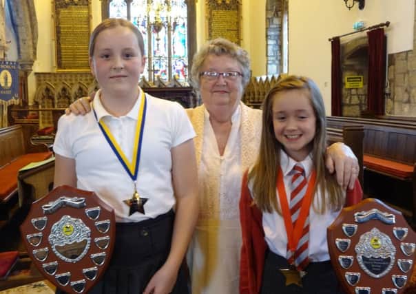 Mrs Norma Neill with Evie Duke of Haxey Primary and Lydia Rowland fo of Westwoodside Primary.