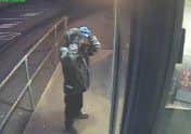 CCTV of a man police are tracing in connection with an armed robbery.