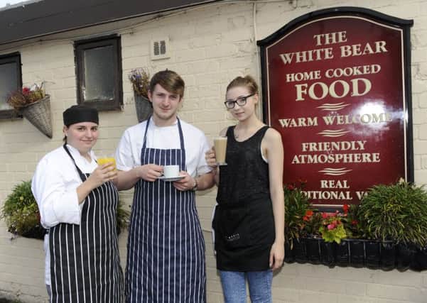 Epworth Bells reader offer - A free coffee, tea or orange juice at The White Bear, Epworth.  Staff members, from left, Paige Benson, Harry Barlow and Coral Thompson