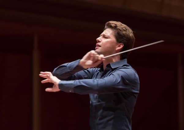 Julian Rachlin, conducting the Royal Liverpool Philharmonic Orchestra.