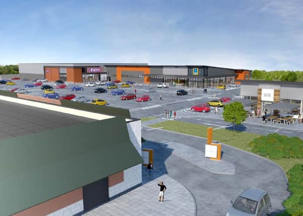 An artists impression of the proposed development at Capitol Park, which will include and Aldi and a B and M