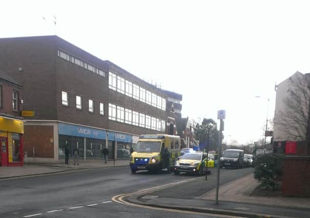 An ambulance and emergency responder vehicle at the scene of an incident on Wood Street, Doncaster town centre.