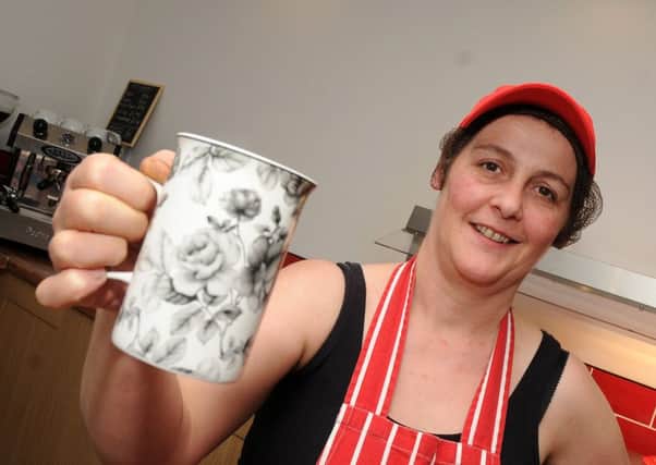 Caroline Walker, of Walker's Diner, Station Street, Swinton holds a cup of coffee which is on offer. Picture: Andrew Roe