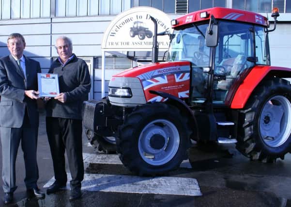 'the last tractor to roll off the production line a the McCormick factory in Doncaster'.  Snaps from man who bought tractor - stephenhaylock@btinternet.com