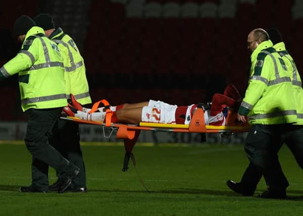 Cameron Stewart is stretchered off during Saturday's 2-2 draw with Gillingham.