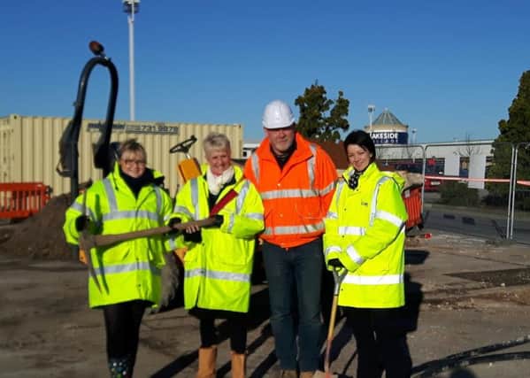 The Lakeside team with Martin Sutcliffe from M3 building contractors in orange jacket at the site of the new Costa Coffee in Doncaster.