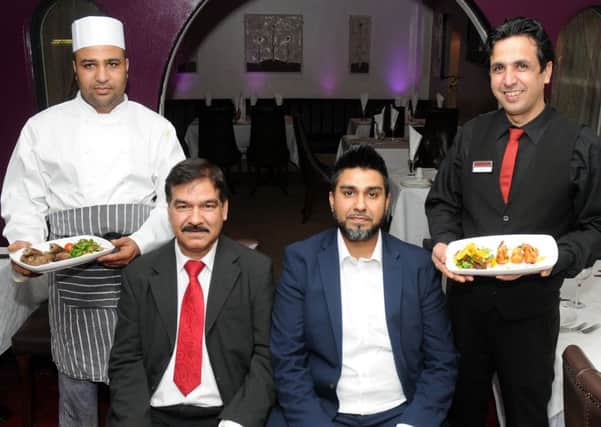 (From left) Chef Mohammed Shafiq, Director Liaqat Ali, General Manager Asif Ali, and Waiter Aziz Ameri of the Aagrah, Great North Road, Woodlands hold up starters which are on offer.
