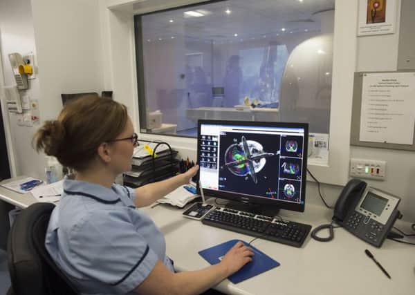 Sheffield Childrens Hospital 
Radiologist Helen Browne looking at a scan by the 3T MRI scanner