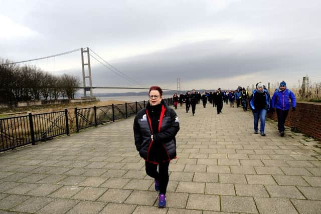 Comedian Jo Brand sets off from Barton in Humber, with a crossing of the Humber Bridge, on the first day of her Hell Of A Walk challenge for Sport Relief. PRESS ASSOCIATION Photo. Picture date: Friday January 22, 2016. She's planning on walking 150 miles in seven days from the England's east coast across to Liverpool. See PA story CHARITY Brand. Photo credit should read: John Giles/PA Wire