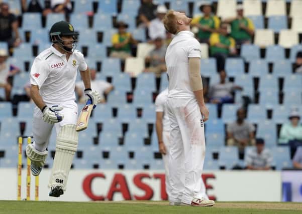 South Africas batsman Stephen Cook, left, reaches his hundred