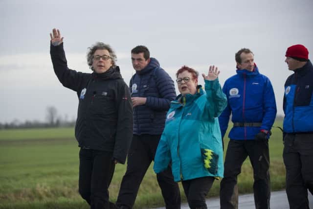 Comic Relief handout photo of Jo Brand being joined by Alan Davies for the second day of her 150 mile walk from Hull to Liverpool.  PRESS ASSOCIATION Photo. Picture date: Saturday January 23, 2016. Day two started at Laxton travelling through Saltmarsh, skelton and around the river Ouse in the morning heading towards day two end at Thorne, South Yorkshire. Photo credit should read: Ian Tuttle/Comic Relief/PA Wire

NOTE TO EDITORS: This handout photo may only be used in for editorial reporting purposes for the contemporaneous illustration of events, things or the people in the image or facts mentioned in the caption. Reuse of the picture may require further permission from the copyright holder.