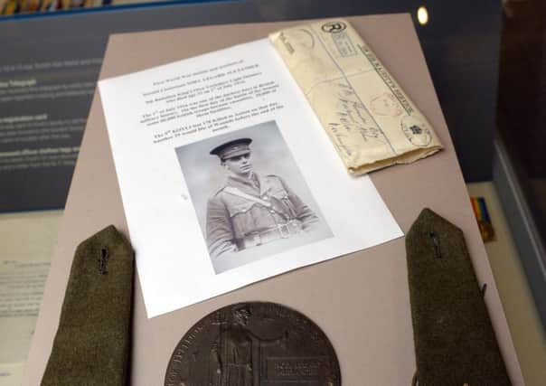 Artefacts on display to visitors at a World War I exhibition at Doncaster Museum.