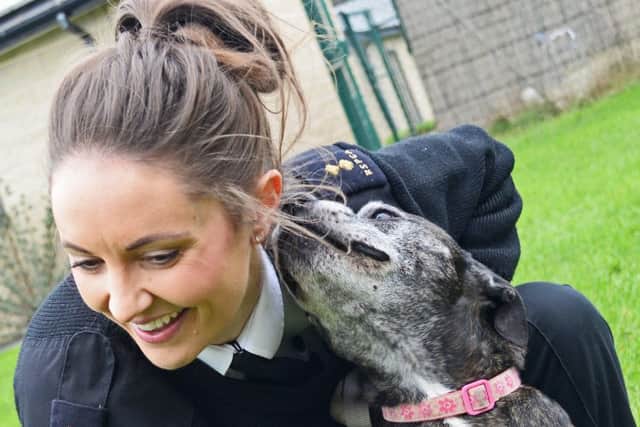 Jennie Ronksley, RSPCA Inspector, pictured with 10-year-old Staffordshire Bull Terrier Jodie. Picture: Marie Caley NSST RSPCA MC 2