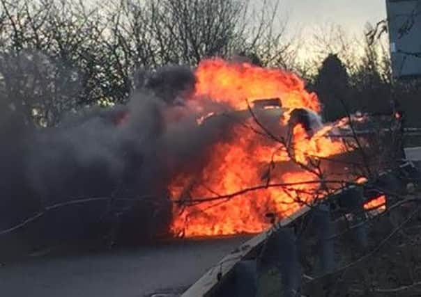 The car fire on the M18 on Saturday afternoon. Pic: Lindsey Harrand
