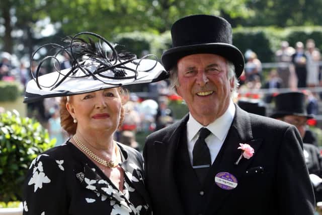 File photo dated 21/06/14 of veteran broadcaster Sir Terry Wogan with Lady Wogan at Royal Ascot, as he has died aged 77 following a short illness. PRESS ASSOCIATION Photo. Issue date: Sunday January 31, 2016. See PA story DEATH Wogan. Photo credit should read: Steve Parsons/PA Wire