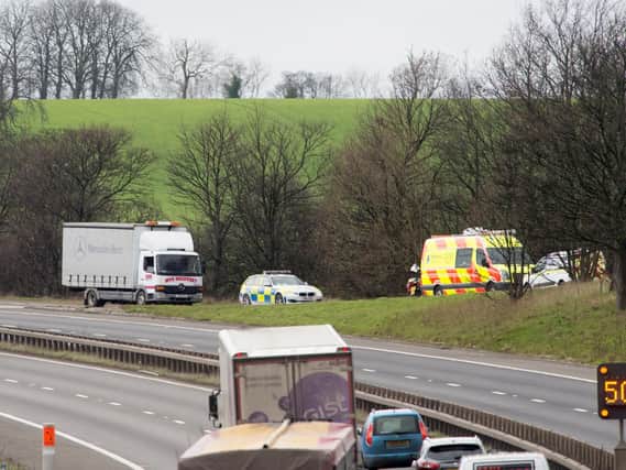 Recovery vehicles at the scene of the accident on the A1 near Doncaster as viewed from Melton Road, Sprotborough